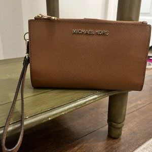 Michael Kors wristlet with space for your phone